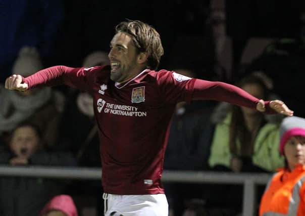 Cobblers winger Ricky Holmes is likely to be on the bench for Saturday's Sky Bet League Two clash against Portsmouth