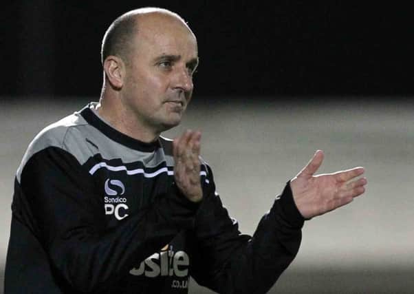 IMPRESSED - Portsmouth boss Paul Cook believes the Cobblers will be one of his team's main challengers for promotion this season (Picture: Sharon Lucey)