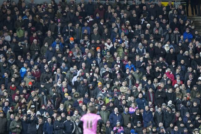 Just some of the 7,040 Cobblers supporters inside stadiummk on Tuesday. Pictures by Kirsty Edmonds