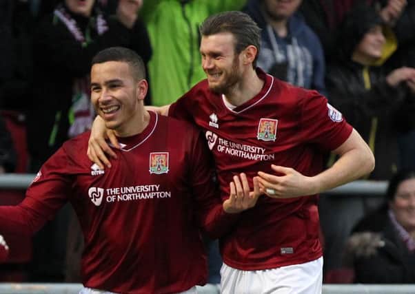IN POSSESSION - Rod McDonald (left) and Zander Diamond are the current first-choice central defenders for the Cobblers