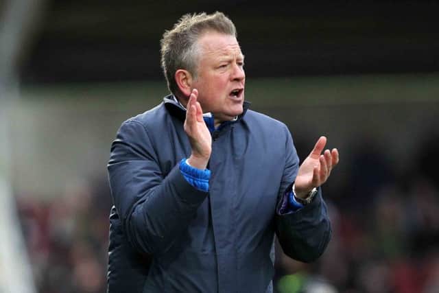 ENJOYING HIMSELF - Cobblers boss Chris Wilder is happy at Sixfields (Picture: Sharon Lucey)