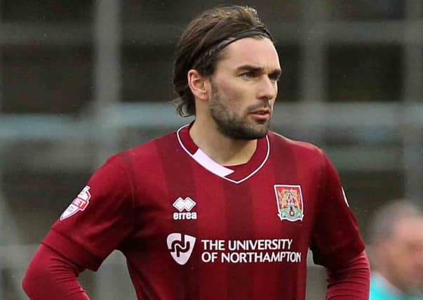 Cobblers playmaker Ricky Holmes