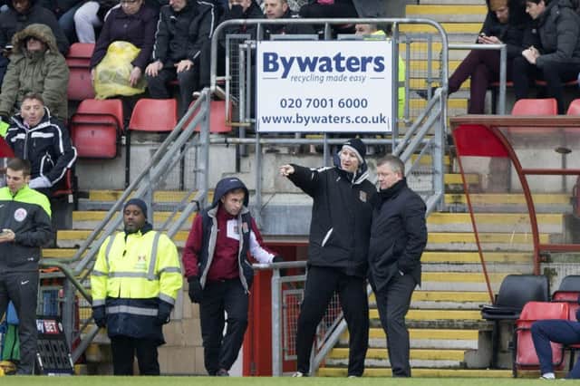Chris Wilder and Alan Knill watch on as their side dismantle Leyton Orient. Picture by Kirsty Edmonds