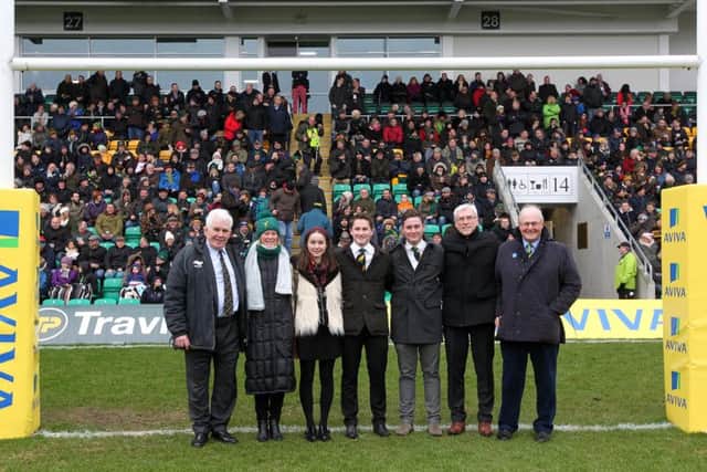 (L-R) David Powell, Ella Bevan, Phoebe Barwell, Ben Barwell, Henry Barwell, Allan Robson and Tony Hewitt in front of the new Barwell Stand