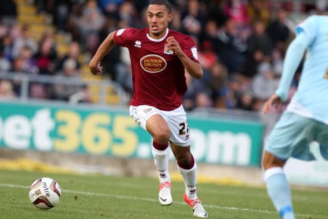 Kemar Roofe in action for the Cobblers in 2012
