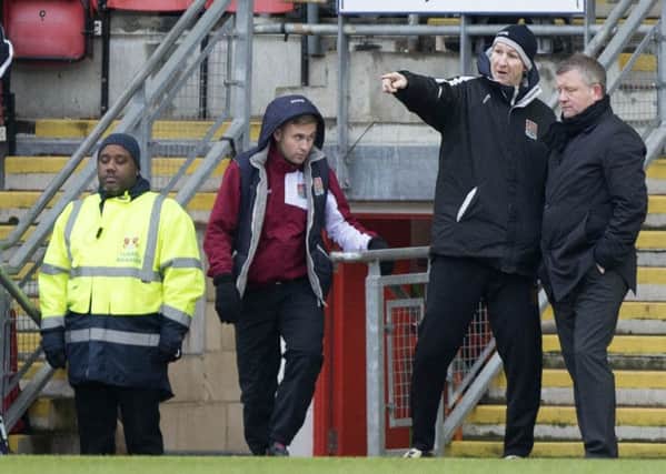 OUT OF ACTION - Joel Byrom was forced to watch the Cobblers match at Leyton Orient from the bench after suffering a neck injury in the warm-up (Picture: Kirsty Edmonds)