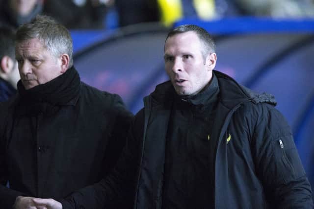 Michael Appleton and Chris Wilder before kick-off. Picture by Kirsty Edmonds