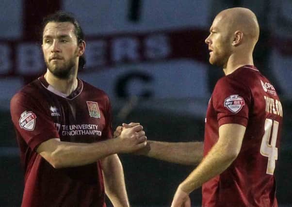 SAME AGAIN? - Jason Taylor (right) will be hoping he has done enough to keep fit-again John-Joe O'Toole out of the Cobblers starting line-up at Hartlepool on Saturday