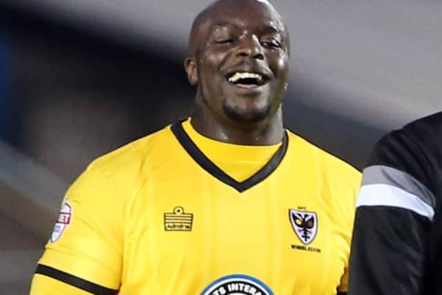 BENCH ROLE - AFC Wimbledon's former Cobblers striker Adebayo Akinfenwa