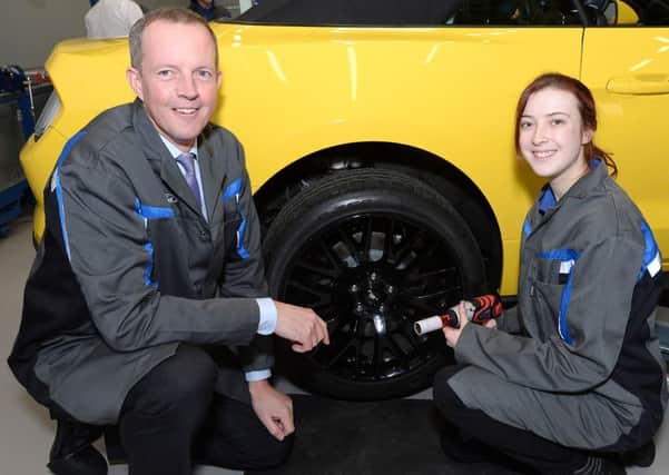 Skills Minister, Nick Boles, with Ford dealer apprentice, Leah Catton