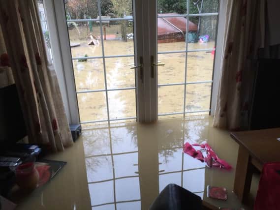 Yvonne Simpson and Martin Price's house was left with extensive damage after flood waters poured thrugh on Wednesday.