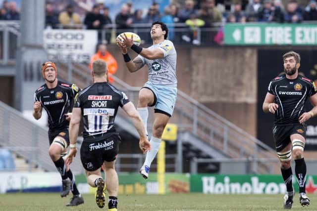 Ken Pisi goes up for a high ball
