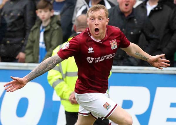 GET IN THERE! - Nicky Adams celebrates firing the Cobblers into the lead against Bristol Rovers (Pictures: Sharon Lucey)