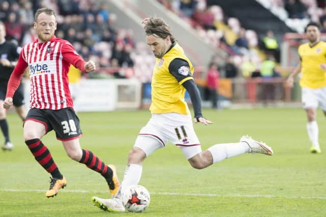 Ricky Holmes takes a pop at goal during Saturday's goalless draw with Exeter City. Pictures: Kirsty Edmonds