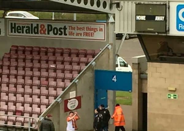 Tim Owen being applauded by the Northampton fans.