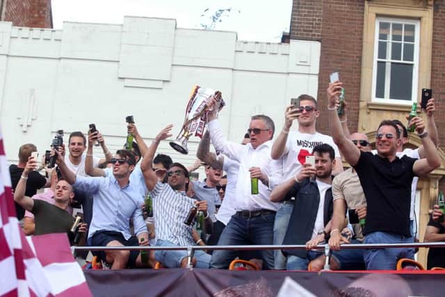 Cobblers victory parade. NNL-160805-185554009