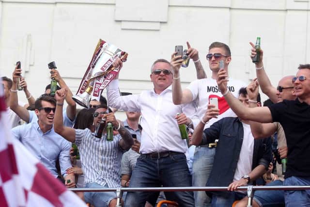 Cobblers victory parade. NNL-160805-185605009