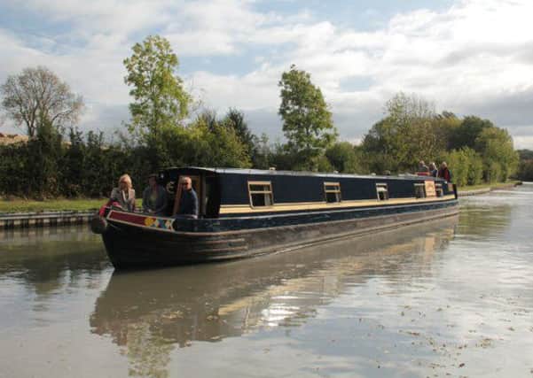 The narrow boat The Canal Boat Crew will use to travel to and from gigs.