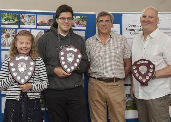 The winners: Scarlett Pratt, Alex Goddard and David Hollis with John Lewis, chairman of Daventry Photographic Society.