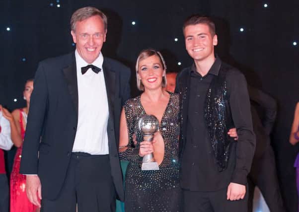 Photo by Rome Davies Photography of Chris Millar leader of Daventry District Council presenting to the winners Sonya Curtis and Sheldon Kane