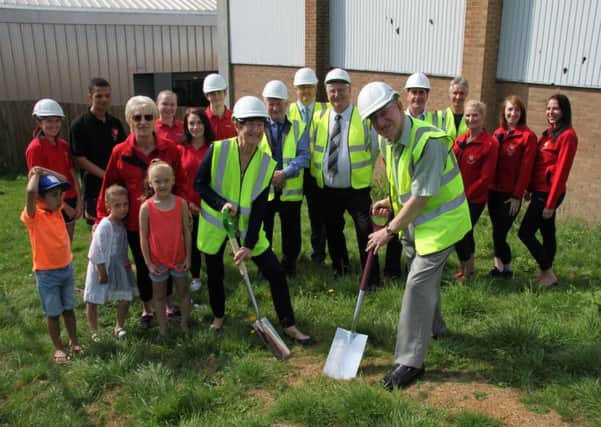 Phoenix Centre President Elaine Bedford and Councillor Alan Hills cut the first sods of turf for the Phoenix Centre extension, joined by representatives from the Phoenix Centre and Daventry District Council