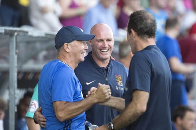 ALL SMILES: Tony Pulis, Rob Page and Paul Wilkinson share a pre-match joke. Picture: Kirsty Edmonds