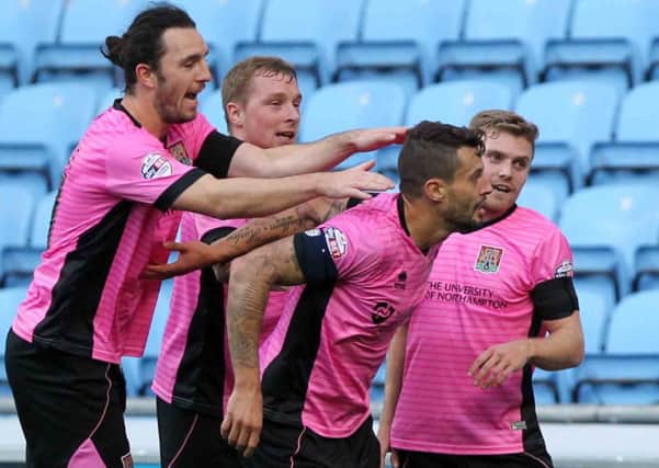 GET IN THERE! - Marc Richards celebrates scoring the winner in the Cobblers' 2-1 win at Coventry City in November (Picture: Sharon Lucey)