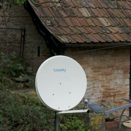 The dish used to connect to the satellite broadband service