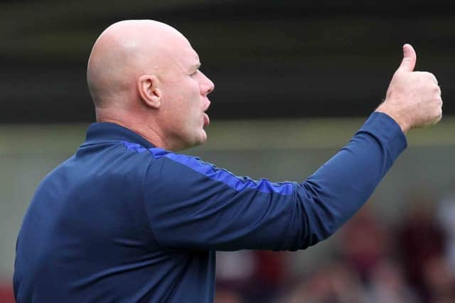 THUMBS UP: Rob Page will be keen to build on Sunday's win over MK Dons when Walsall visit Sixfields this weekend. Pictures: Sharon Lucey
