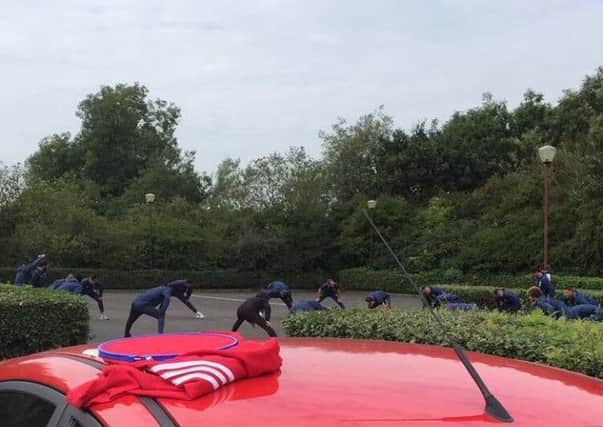 Manchester United train for tonight's match in a Northamptonshire hotel car park. Pictures courtesy of @isla2410.