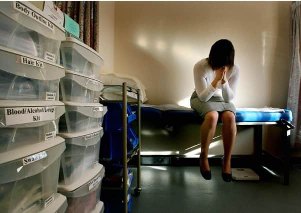 PICTURE POSED BY MODEL
File photo dated 31/01/07 of a woman waiting to be seen by a doctor in the medical room at a specialist rape clinic in Kent. Every victim of rape should be offered the support of a specialist adviser to help them keep faith in the criminal justice system, a landmark review recommended today. PRESS ASSOCIATION Photo. Issue date: Monday March 15, 2010. Hundreds of independent workers would help those whose lives were torn apart by sexual violence make sense of the police inquiry and the prosecution of those responsible. Baroness Stern said independent sexual violence advisers, a post being piloted in some areas, provide a key link between the victim and police, prosecutors and charity groups. See PA story POLITICS Stern. Photo credit should read: Gareth Fuller/PA Wire ENGNNL00120110714151009