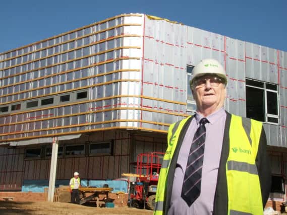 Cllr Colin Poole at the construction site for the Daventry Hill School off Ashby Road