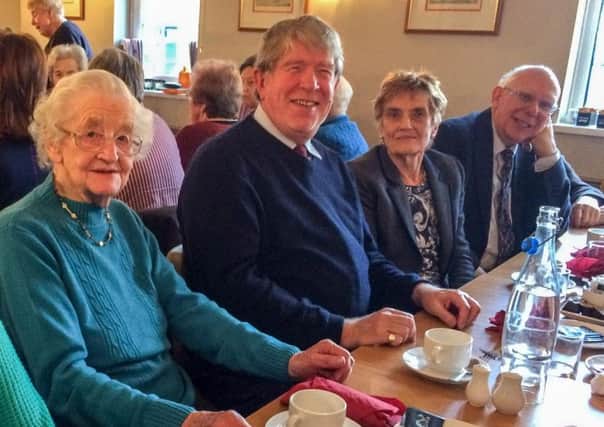Members enjoy the anniversary lunch.