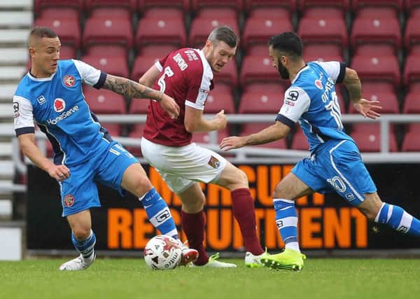 Zander Diamond in action during the Cobblers' 2-0 win over Walsall earlier this season