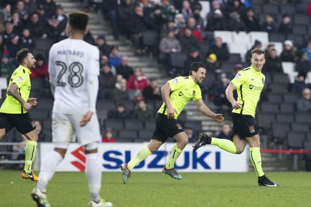 Gregg Wylde celebrates his stunning strike in the defeat at Milton Keynes Dons