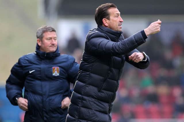 WORK TO DO: Justin Edinburgh has seen progress in his short time in charge but knows there's more to come. Pictures: Sharon Lucey
