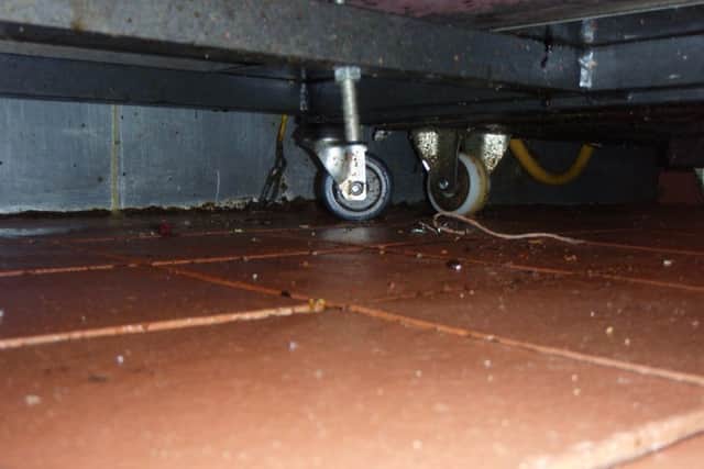 Floor grime inside Asia Tandoori restaurant