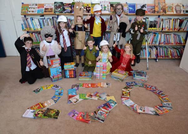Children celebrate World Book Day.