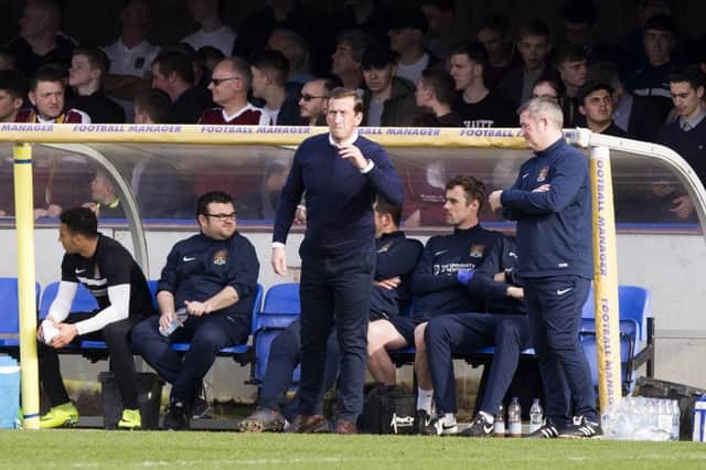 LEFT IT LATE: Justin Edinburgh made the call for Matty Taylor to take his side's late penalty. Picture by Kirsty Edmonds