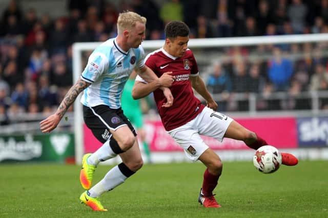 Action from Easter Monday's clash at Sixfields. Picture by Sharon Lucey