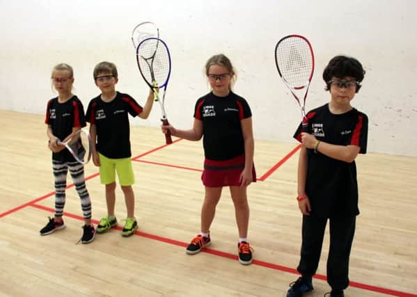 Children enjoying squash sessions.
