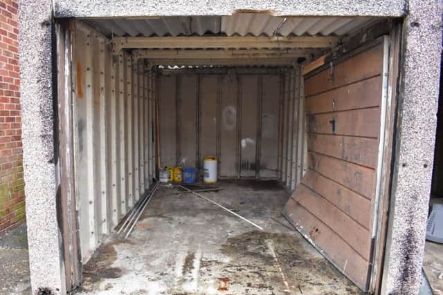 Some garages had abandoned pots of paint and chemicals