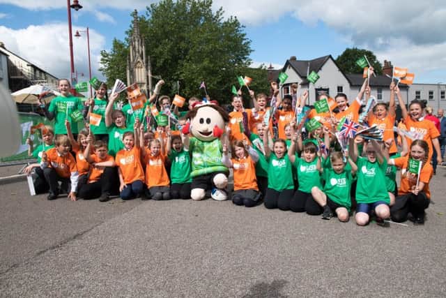 Pupils from Falconers Hill Academy (in orange) and The Abbey CE Academy (in green)
