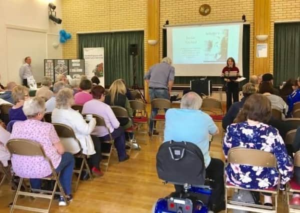 Mary-Jane Brown gives a talk at an event focussing on falls prevention at Moulton Village Hall