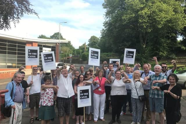 Protests were held outside the civic buildings ahead of the July strategy group meeting in which the recommendation for funding was backed by councillors.