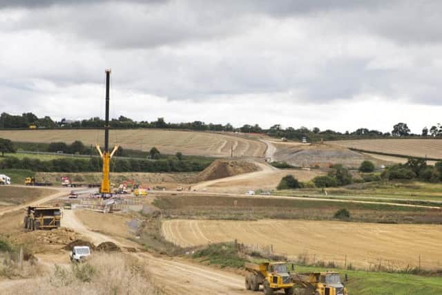 The link road cuts across several existing country roads.