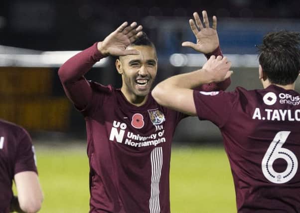 ALL SMILES - Lewis McGugan opened his goal account for the Cobblers in midweek (Pictures: Kirsty Edmonds)